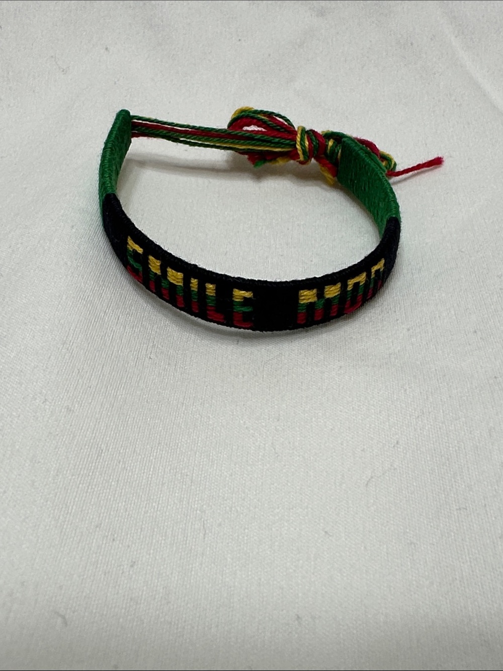 Stanley Black, Green, Red & Yellow Woven Bracelet